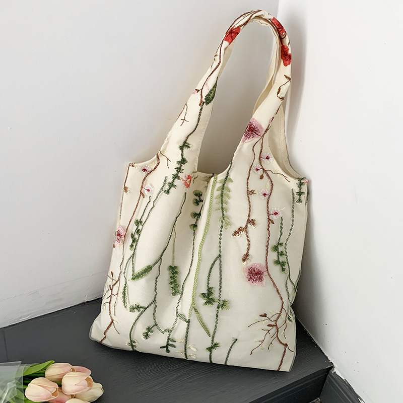 Autumn new embroidered black butterfly canvas bag lace casual travel women's shoulder bag niche design capacity women's crossbody bag Autumn