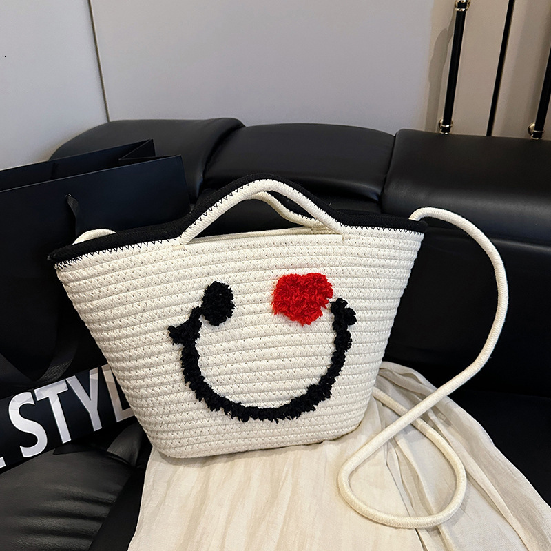 Summer Smiley Crossbody for Women 2025 New Versatile Beach Woven Internet Celebrity Handheld Basket Bag ddmymoon