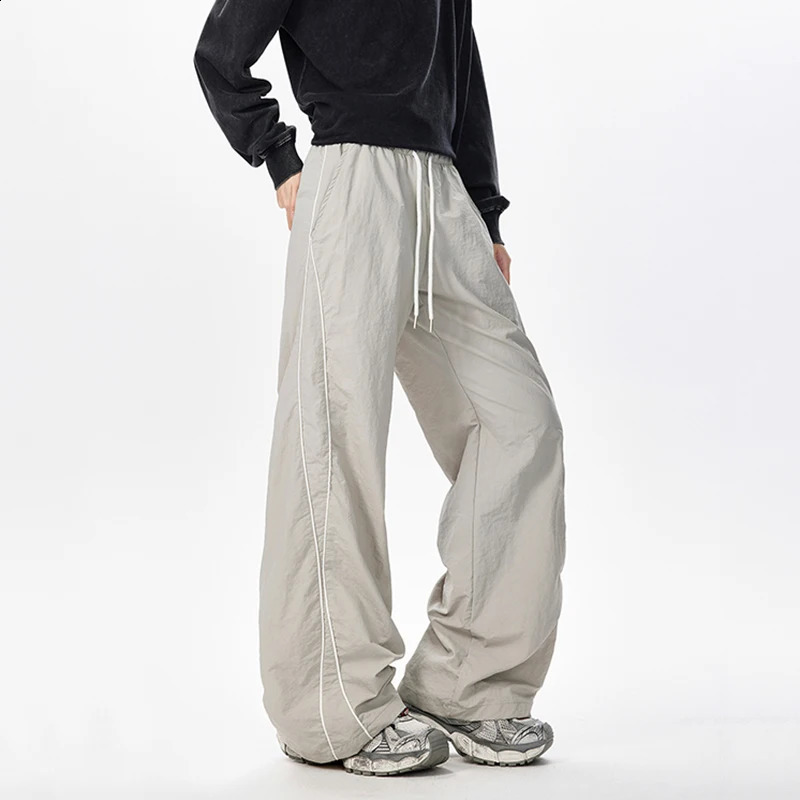 IEFB Korean Style Mens Casual Pants Soldi Color Line Contrast Color Elastic Waist Male Drawstrinf Bottom Simple 9W4124 250805