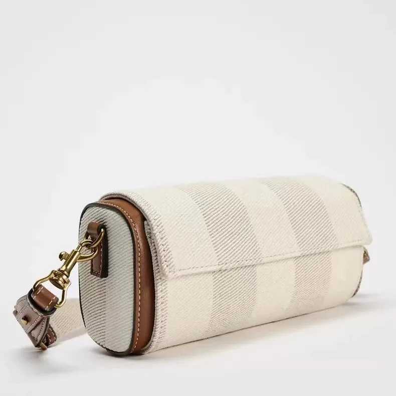 Autumn New Womens Bag Vanilla Yellow Flip Cover Versatile Commuting Cylindrical Bag Cylindrical Shoulder Crossbody Bag Z250811