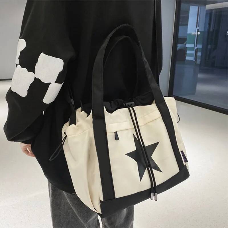 Autumn New Large Capacity Niche Women's Crossbody Bag Star Pattern Drawstring Design Women's Shoulder Bag Casual Style Commuting Bag Autumn 