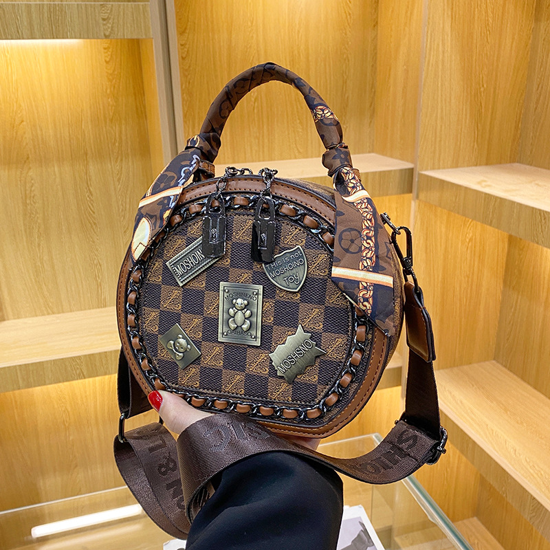 free shipping designer bags Luxury Bags Fashionable metal patch Bear metal brand small round bag with exquisite patterns