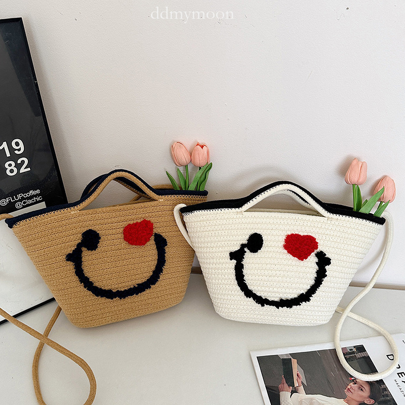 Summer Smiley Crossbody for Women 2025 New Versatile Beach Woven Internet Celebrity Handheld Basket Bag ddmymoon
