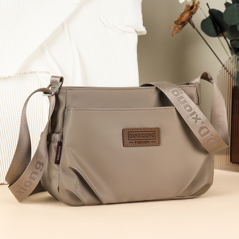 Waterproof Nylon Cloth Lightweight Casual Shoulder Women 2025 New Simple Multi-layer Large Capacity Crossbody Bag ddmymoon