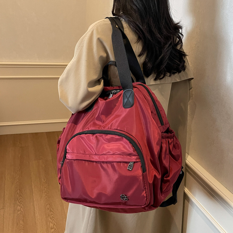 Casual Lightweight Nylon Backpack for Women, New Simple Large Capacity Commuter Travel Bag, Multi-use Handheld and Shoulder Bag ddmymoon