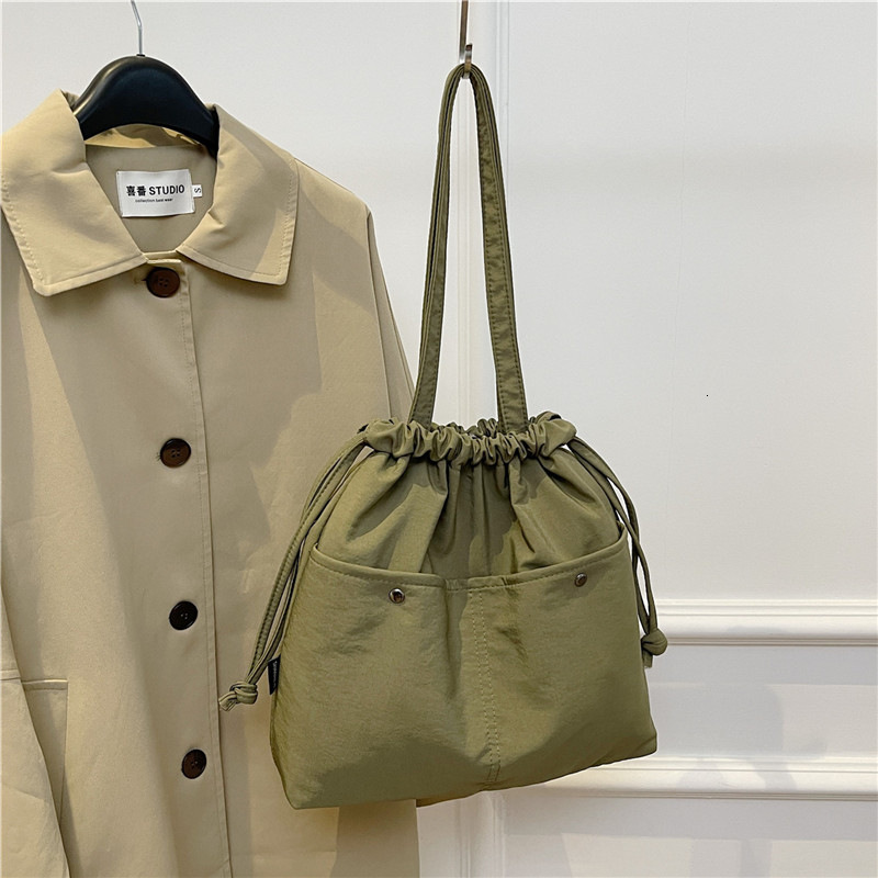 New Drawstring Nylon Underarm Design Handheld Bucket Large Capacity Shoulder Bag Trendy Versatile Commuting