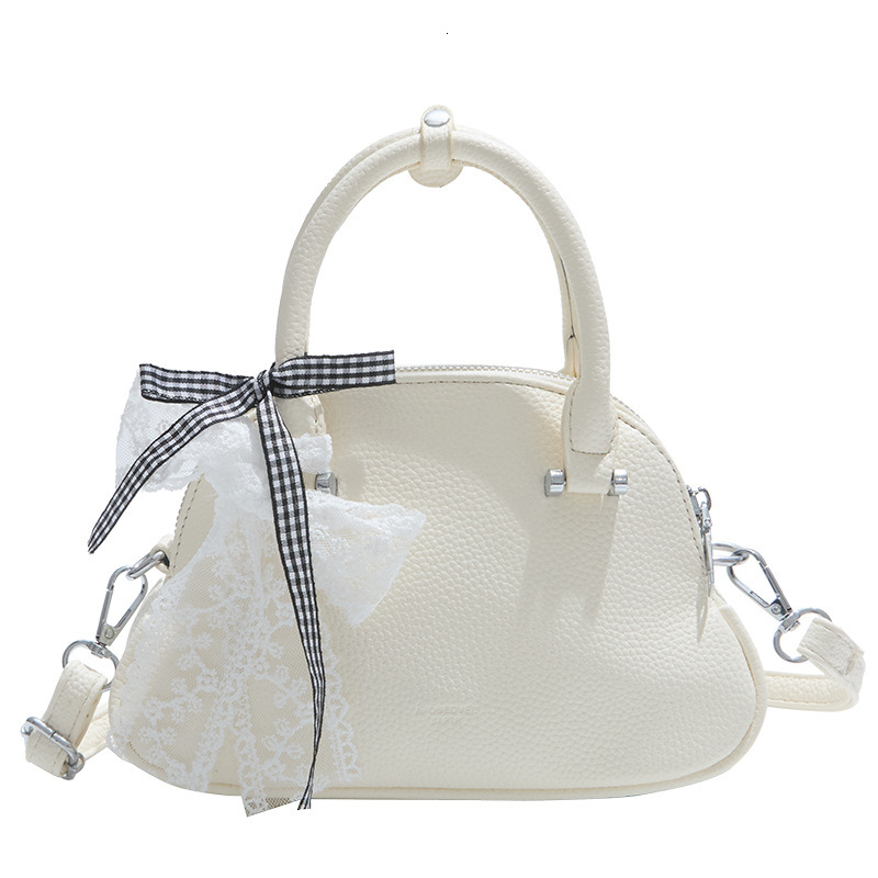 Korean Niche Fashionable Handheld Shell for Women 2025 Spring New Stylish High-Quality Texture Single Shoulder Crossbody Bag ddmymoon