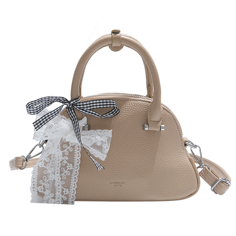 Korean Niche Fashionable Handheld Shell for Women 2025 Spring New Stylish High-Quality Texture Single Shoulder Crossbody Bag ddmymoon