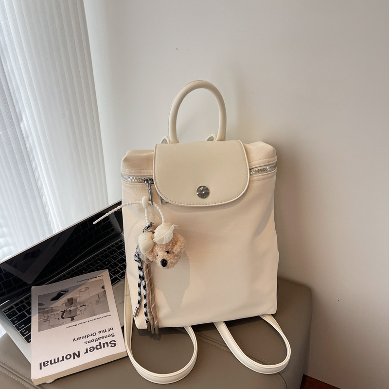 2025 Summer New Fashion Versatile Solid Color Backpack Street Trend Light Luxury Cute Women Large Capacity Commuter Bag ddmymoon