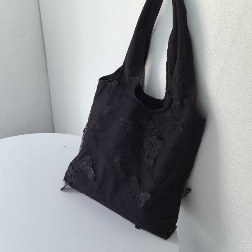 Autumn new embroidered black butterfly canvas bag lace casual travel women's shoulder bag niche design capacity women's crossbody bag Autumn