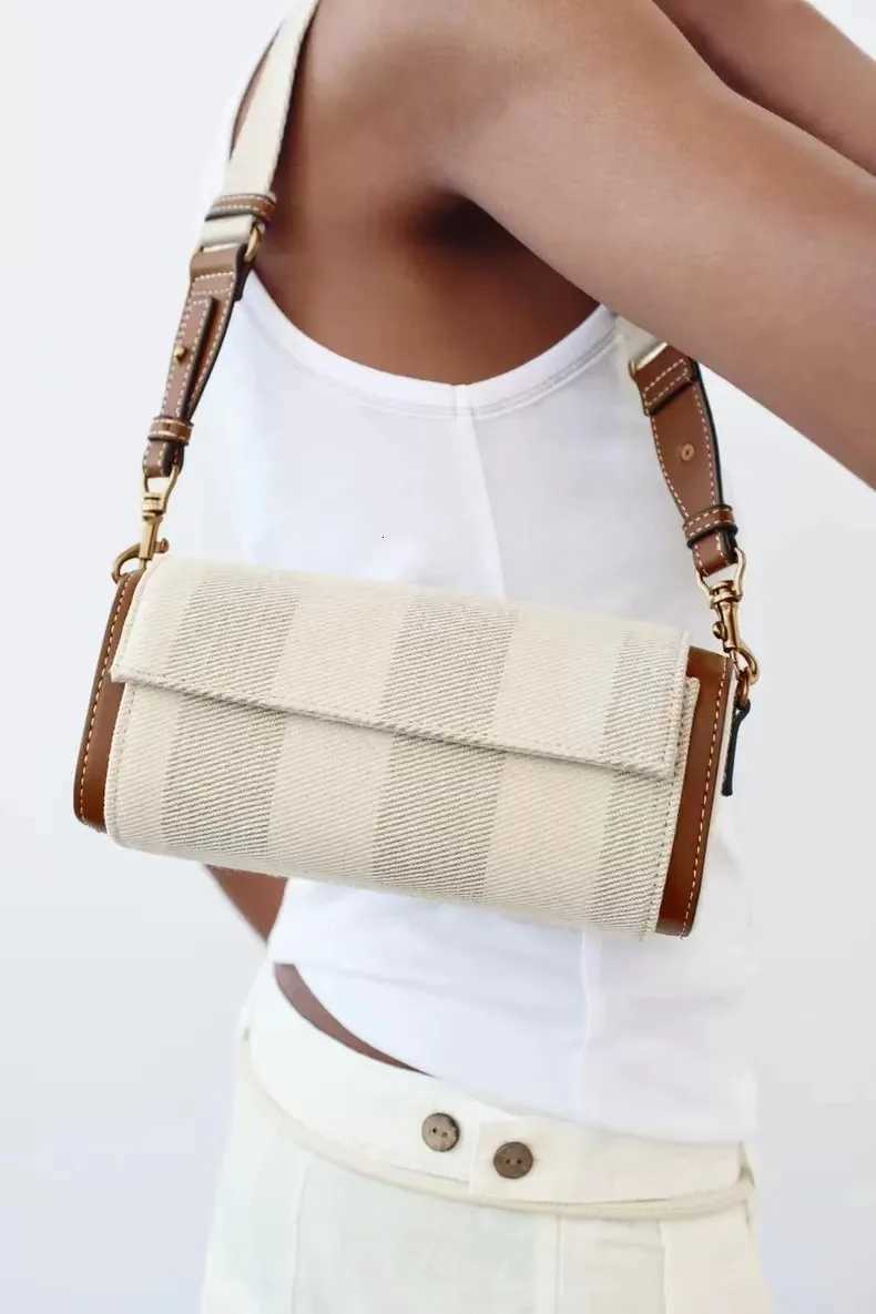 Autumn New Womens Bag Vanilla Yellow Flip Cover Versatile Commuting Cylindrical Bag Cylindrical Shoulder Crossbody Bag Z250811
