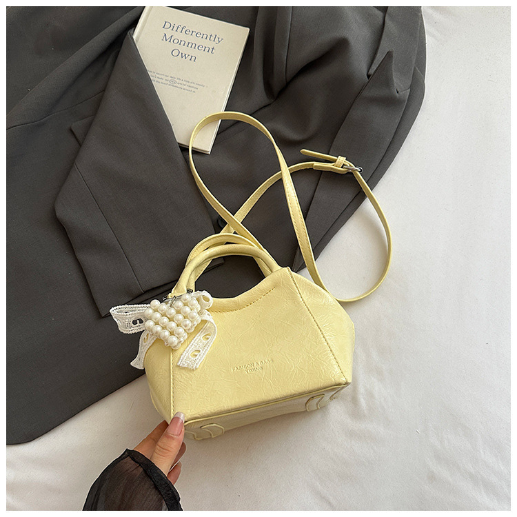 2025 Summer New Fashion Trendy Simple Style Handheld Bucket Stylish Commuter Solid Color Crossbody Women's Bag ddmymoon