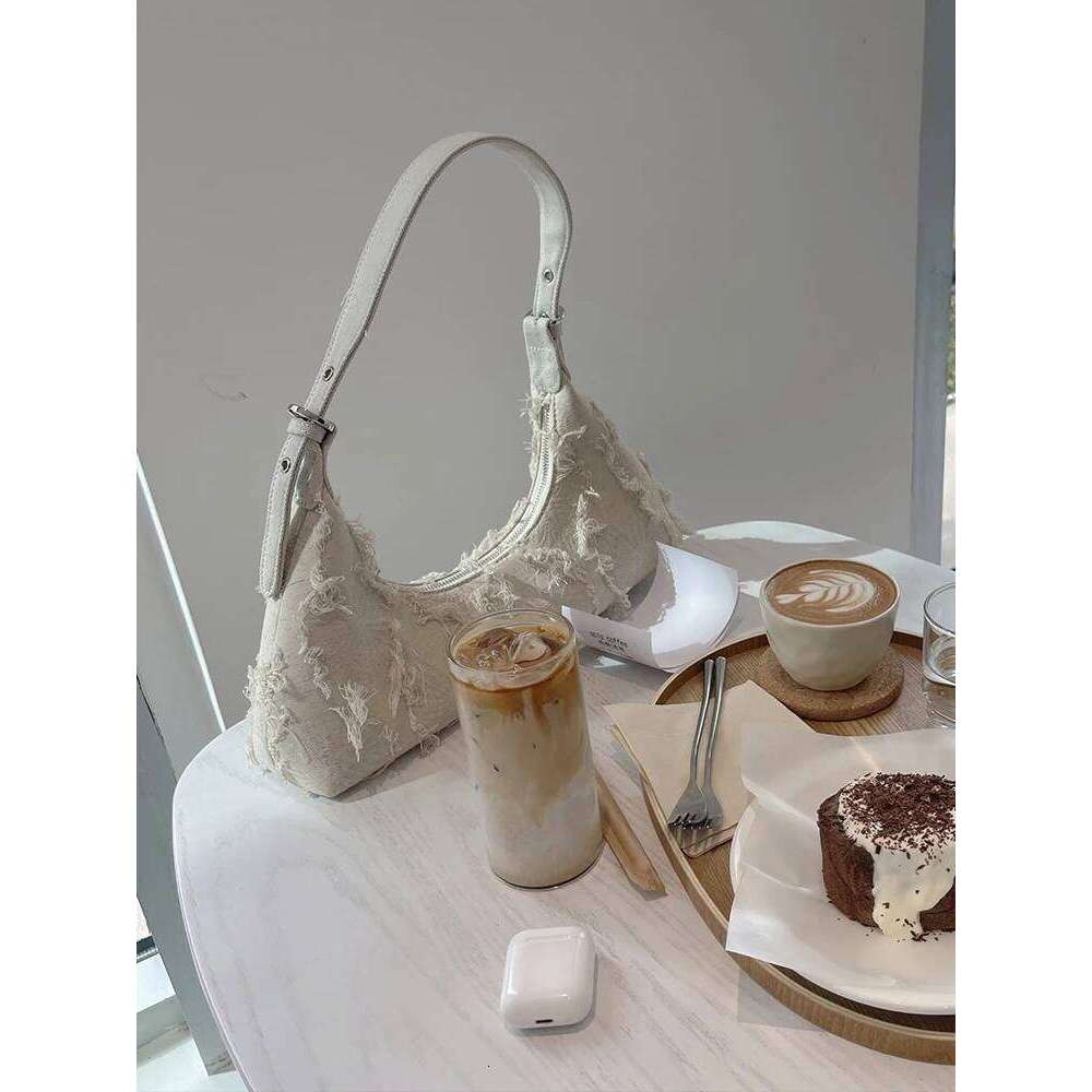 Celebrity Same Style Ins Blogger Baguette ing Canvas Patch Tassel Retro Single Shoulder Armpit Bag for Women