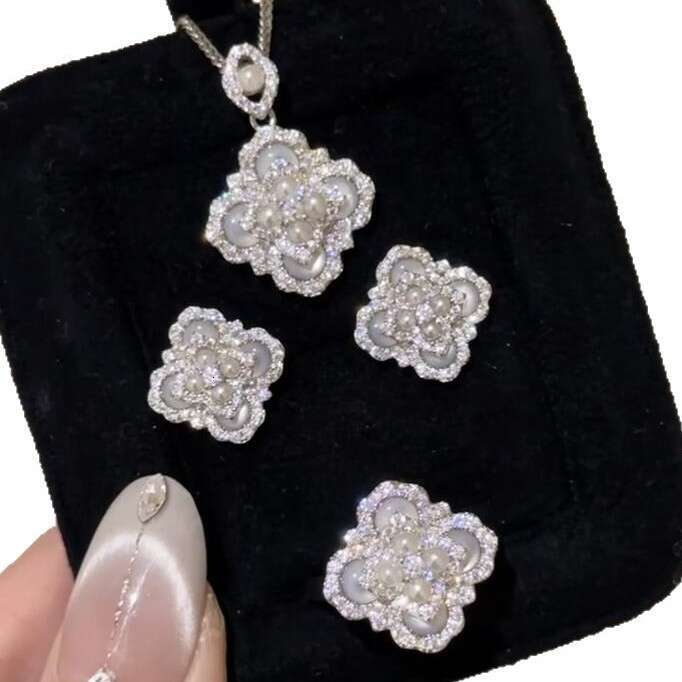 Light National Trend White Cat's Eye Stone Pearl Four-leaf Clover Necklace Earrings Ring Exquisite Sense of Temperament Versatile Set