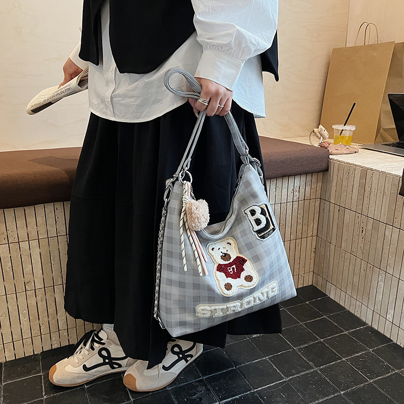 2025 New Student Chain Tote Backpack Female Niche Design Sense Bear Shoulder Crossbody Bag ddmymoon