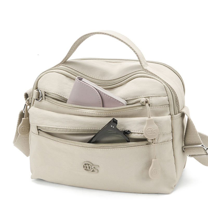 Waterproof Lightweight Nylon Cloth Women 2025 New casual Casual Multi-layer Large Capacity Shoulder Crossbody Bag ddmymoon
