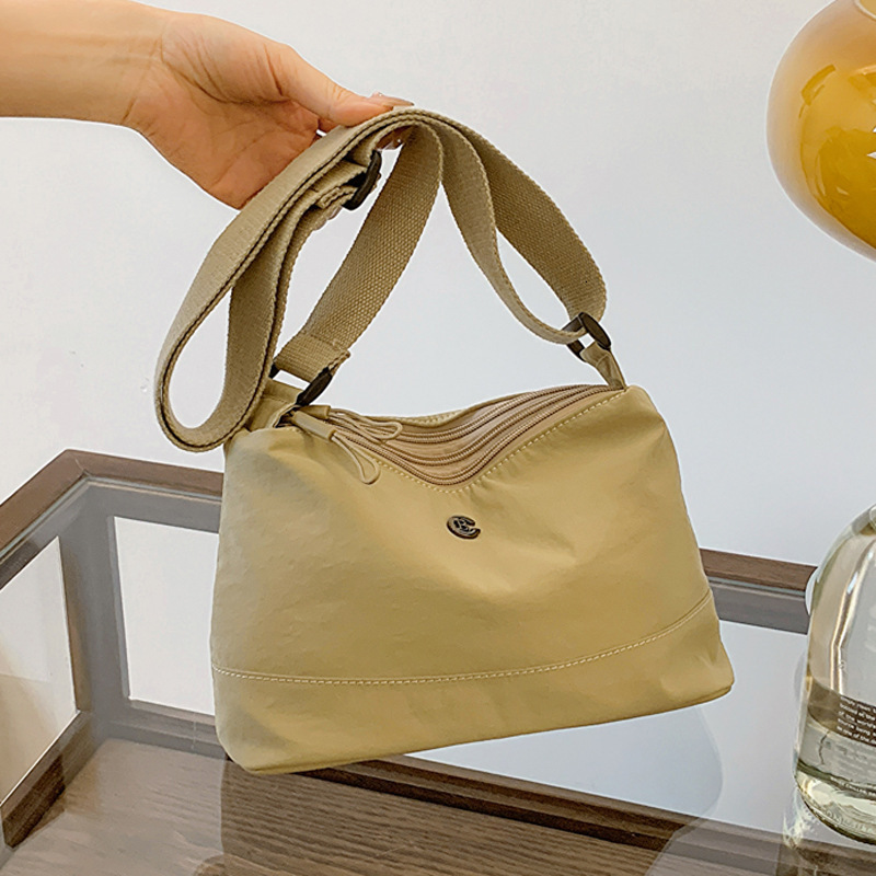 Minimalist Waterproof Lightweight Casual Fabric Unisex Fashion Commuter Three-Layer Large Capacity Shoulder Crossbody Bag ddmymoon