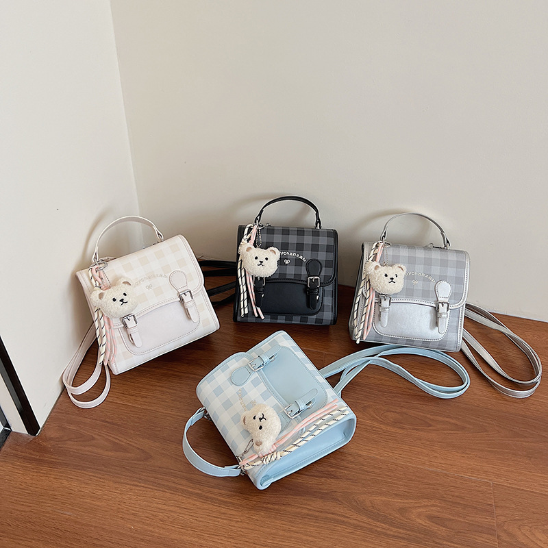 2025 High-end Fashion Cute Youthful Plaid Bag Large Capacity Commuter with Pendant Handheld Backpack for Women ddmymoon