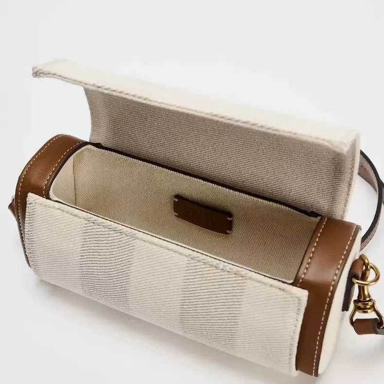 Autumn New Womens Bag Vanilla Yellow Flip Cover Versatile Commuting Cylindrical Bag Cylindrical Shoulder Crossbody Bag Z250811