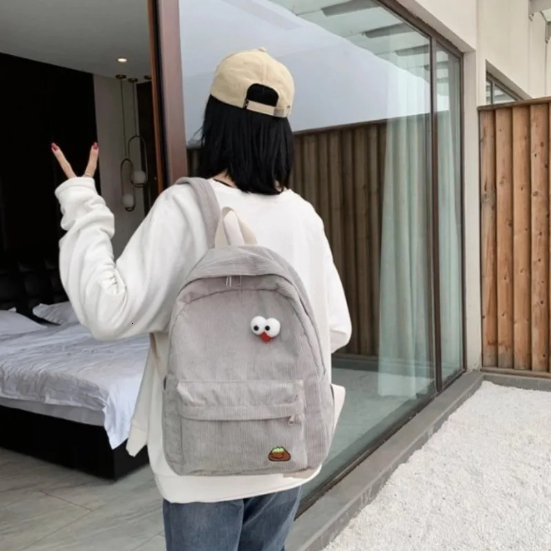 Korean version of the college style schoolbag largecapacity corduroy backpack junior high school womens outdoor l 250811