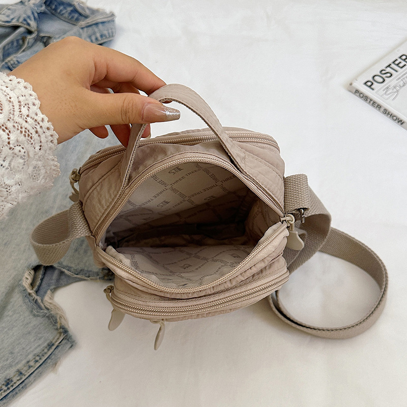 Lightweight waterproof nylon unisex outdoor casual multi-compartment large capacity shoulder crossbody bag ddmymoon