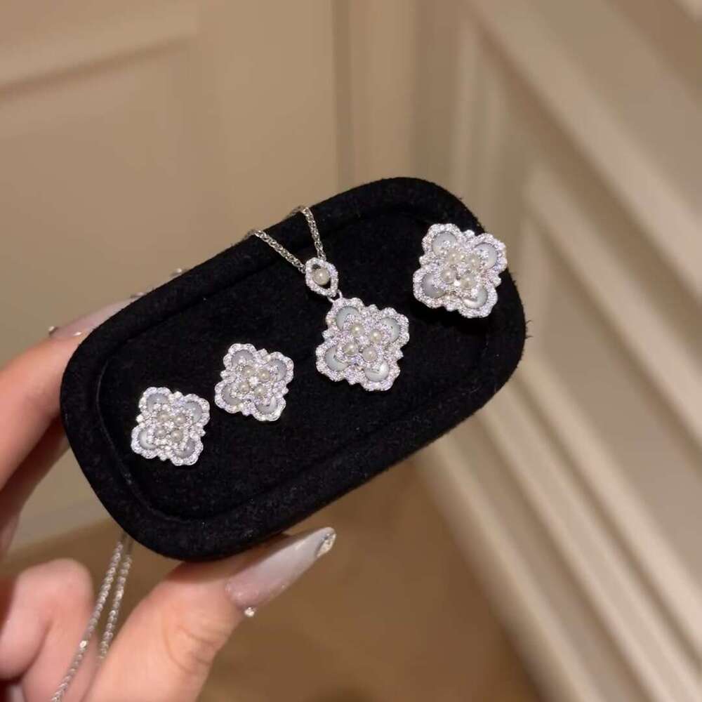 Light National Trend White Cat's Eye Stone Pearl Four-leaf Clover Necklace Earrings Ring Exquisite Sense of Temperament Versatile Set