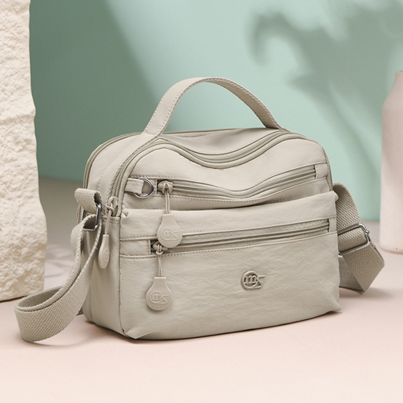 Waterproof Lightweight Nylon Cloth Women 2025 New casual Casual Multi-layer Large Capacity Shoulder Crossbody Bag ddmymoon