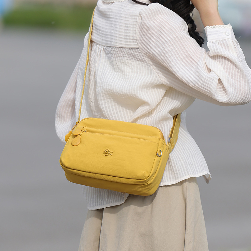 Waterproof Nylon Cloth Women's 2025 New Lightweight Casual Outdoor Multi-compartment Shoulder Crossbody Bag ddmymoon