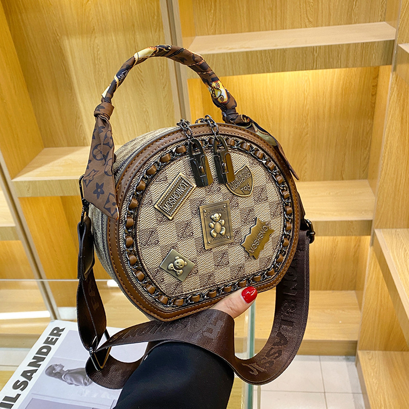 free shipping designer bags Luxury Bags Fashionable metal patch Bear metal brand small round bag with exquisite patterns