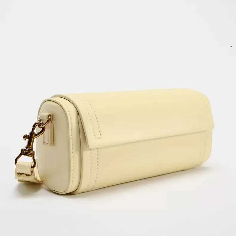 Autumn New Womens Bag Vanilla Yellow Flip Cover Versatile Commuting Cylindrical Bag Cylindrical Shoulder Crossbody Bag Z250811