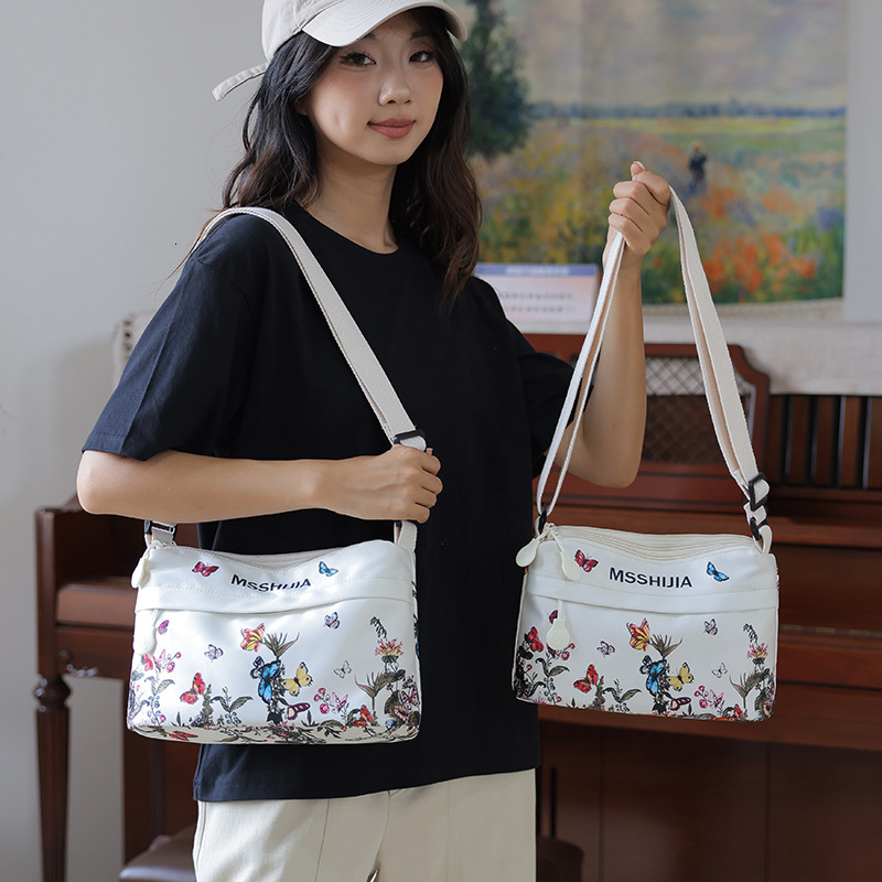 Lightweight Waterproof Nylon Trendy Printed Crossbody for Women New Casual Three-Layer Large Capacity Shoulder Bag ddmymoon
