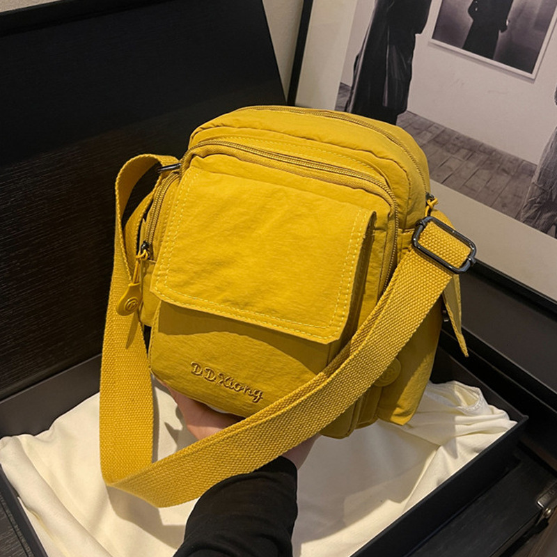 Hot Selling Waterproof Lightweight Nylon Women's New Outdoor Casual Shoulder Crossbody Multi-Pocket Camera Bag ddmymoon
