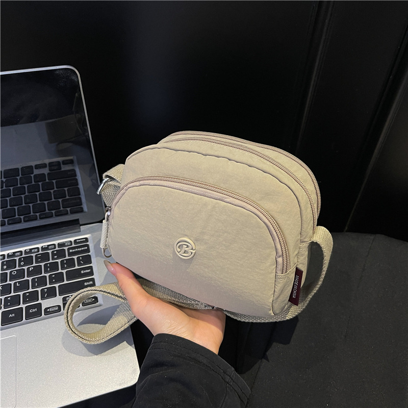 Ultra-light Waterproof Nylon Women's New Trendy Casual Outdoor Sports Crossbody Multi-flap pocket pants Shoulder Bag ddmymoon