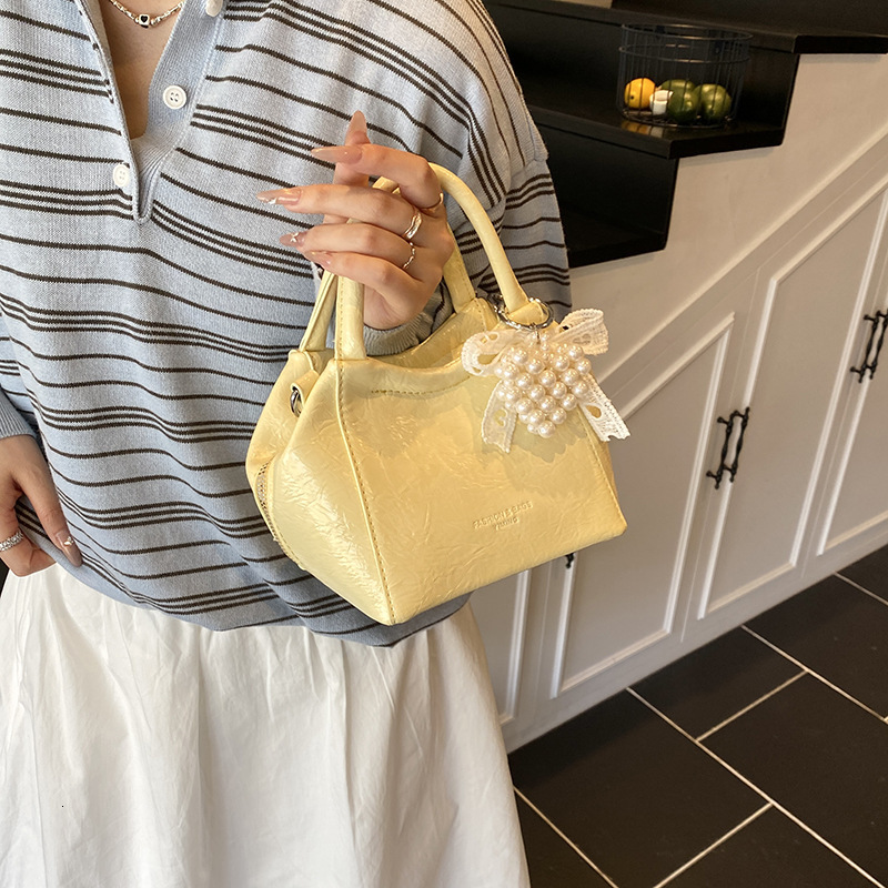 2025 Summer New Fashion Trendy Simple Style Handheld Bucket Stylish Commuter Solid Color Crossbody Women's Bag ddmymoon