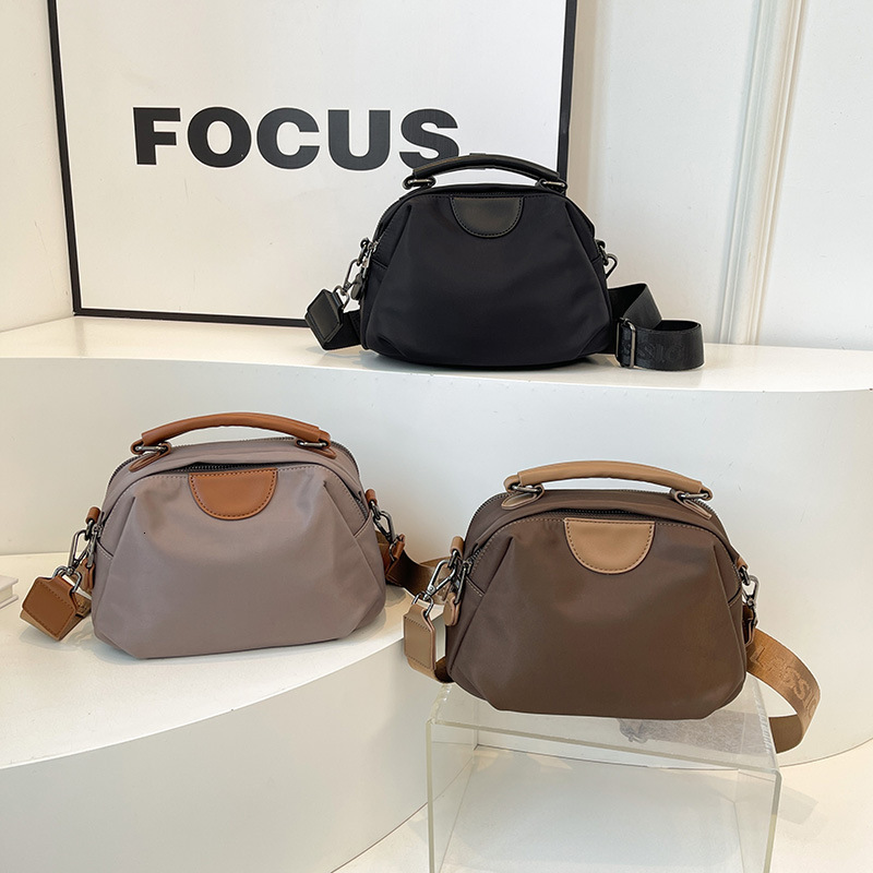 Lightweight Oxford Cloth Handbag for Women 2025 New Simple Casual Multi-layer Large Capacity Single Shoulder Crossbody Bag ddmymoon