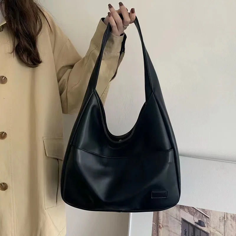 Large capacity tote bag black leather simple casual commuting womens fashionable and versatile single shoulder 250811
