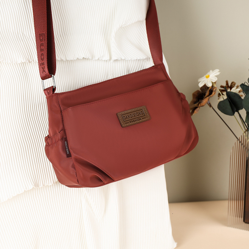 Waterproof Nylon Cloth Lightweight Casual Shoulder Women 2025 New Simple Multi-layer Large Capacity Crossbody Bag ddmymoon