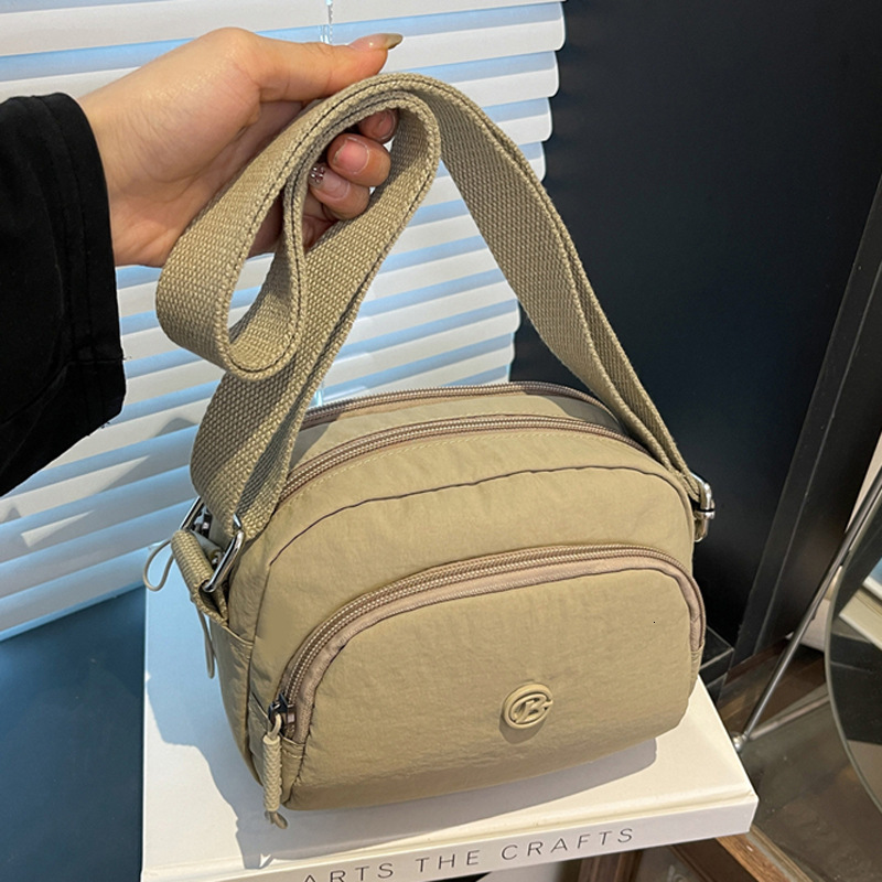 Ultra-light Waterproof Nylon Women's New Trendy Casual Outdoor Sports Crossbody Multi-flap pocket pants Shoulder Bag ddmymoon