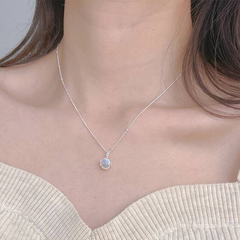 Popular sterling sier moonstone hollow necklace for women exquisite blue round pendant collarbone chain fashionable jewelr