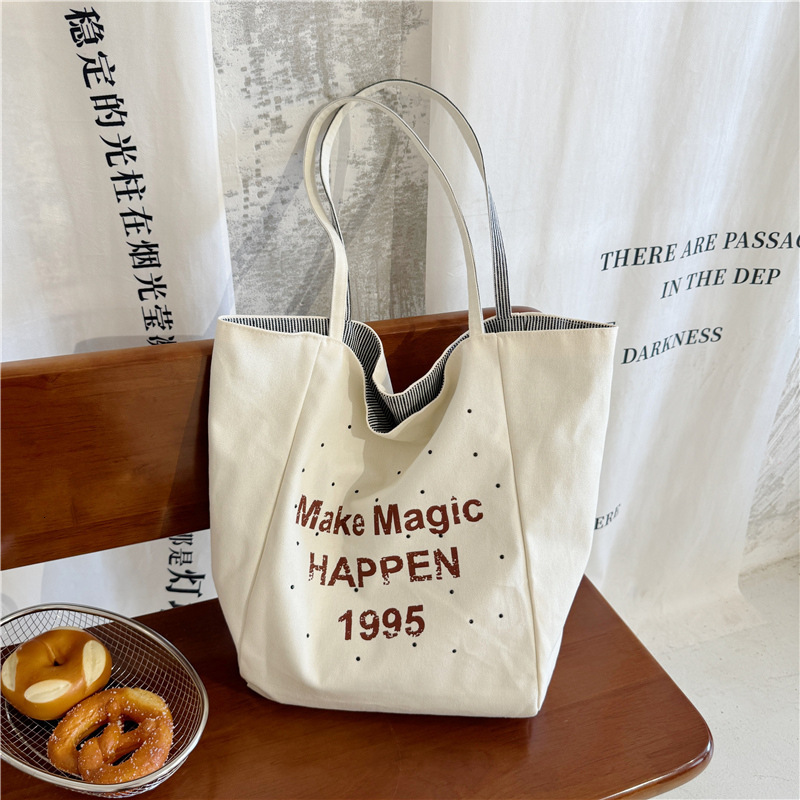 Summer Double-Sided Large Capacity Canvas 2025 New Korean Version Commuter Shoulder Tote Niche Shopping Bag ddmymoon