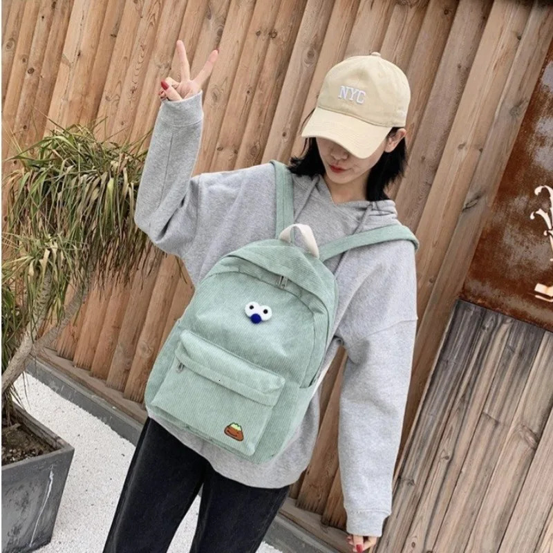 Korean version of the college style schoolbag largecapacity corduroy backpack junior high school womens outdoor l 250811