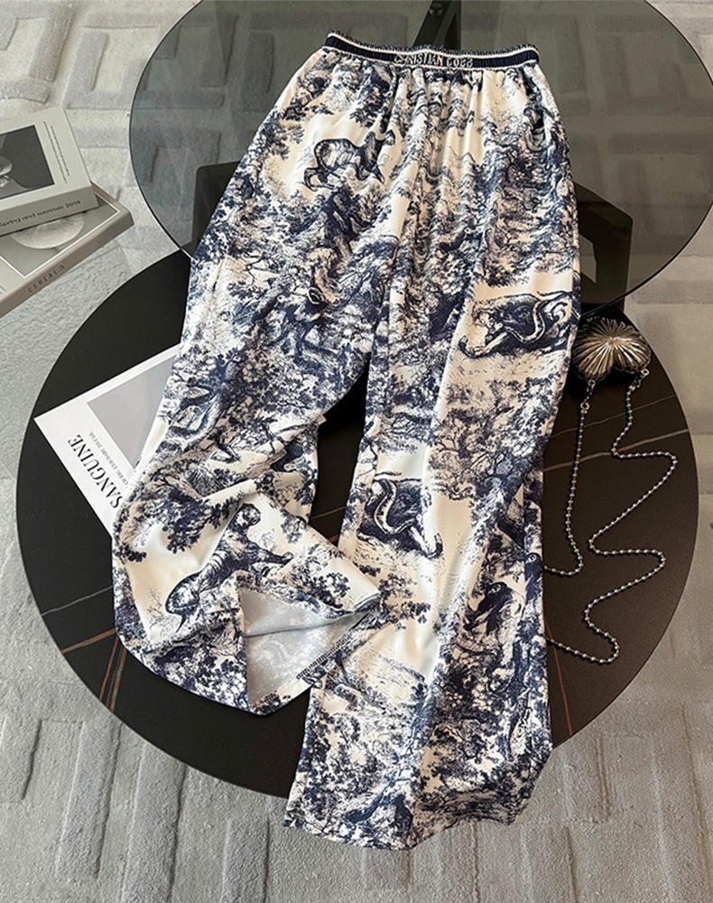 Modern Urban Fashion Ensemble: Coordinated Tank Tops & Loose-Fitting Joggers by Leading Brands