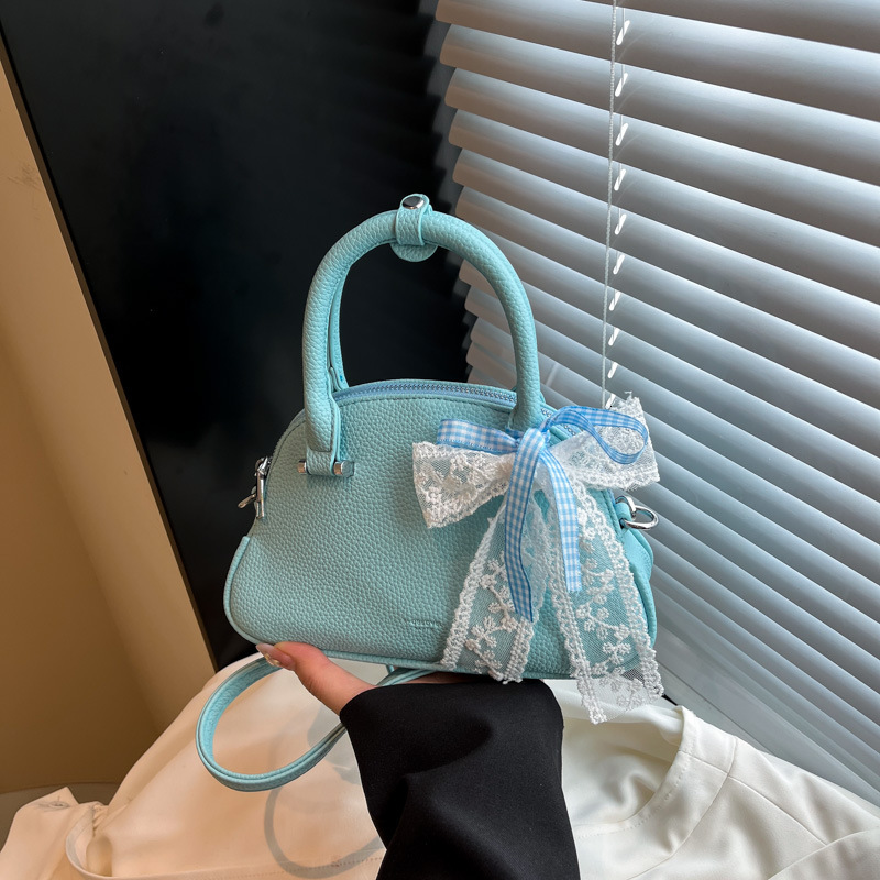 Korean Niche Fashionable Handheld Shell for Women 2025 Spring New Stylish High-Quality Texture Single Shoulder Crossbody Bag ddmymoon