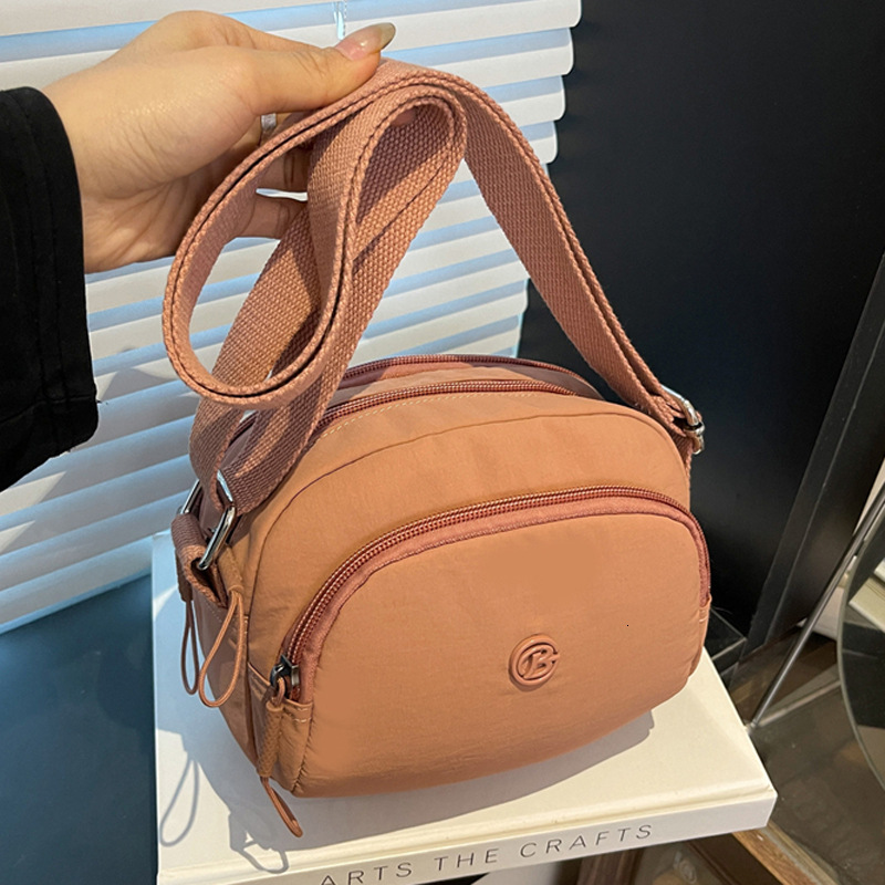 Ultra-light Waterproof Nylon Women's New Trendy Casual Outdoor Sports Crossbody Multi-flap pocket pants Shoulder Bag ddmymoon
