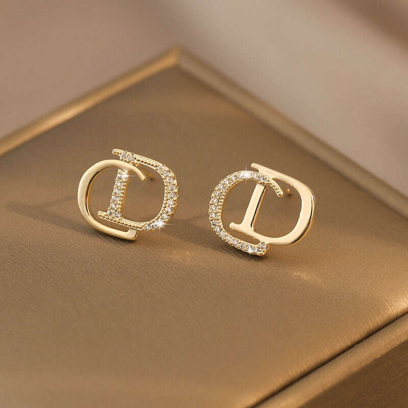 DHcollections Letter CD Ins Style Rhinestone Hollow Socialite Light S Pure Sier Needle Earrings for Women