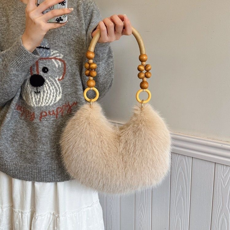 2025 Autumn New Women's Shoulder Bag Autumn Fur Handbag Sexualized Creative Handbag Women's Crossbody Bag Designer Bag