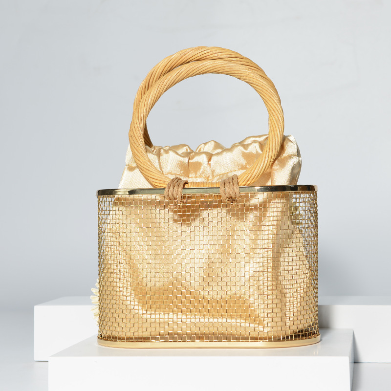 2025 new hand woven hollow vegetable basket water bucket handbag designer evening bag