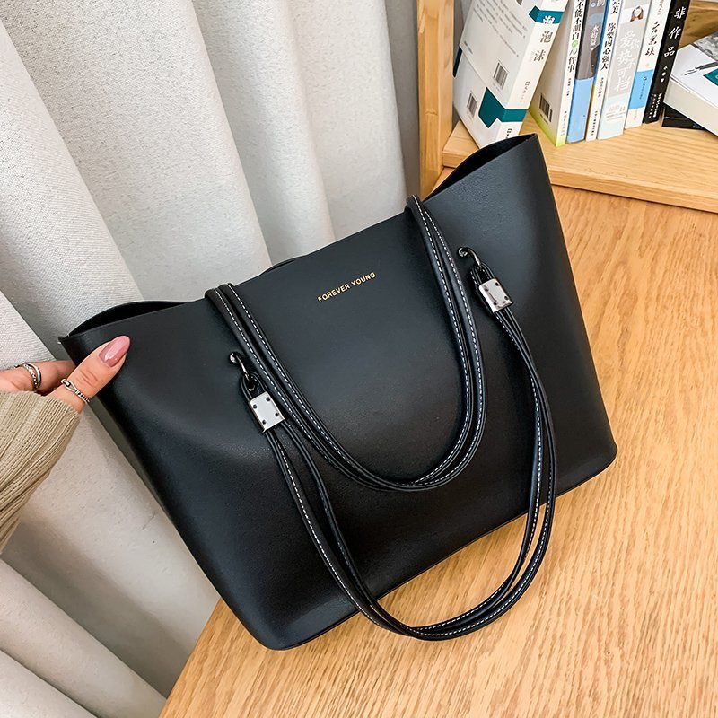 Elegant Womans Casual Shoulder Backpack with Roomy Compartment & Trendy Design