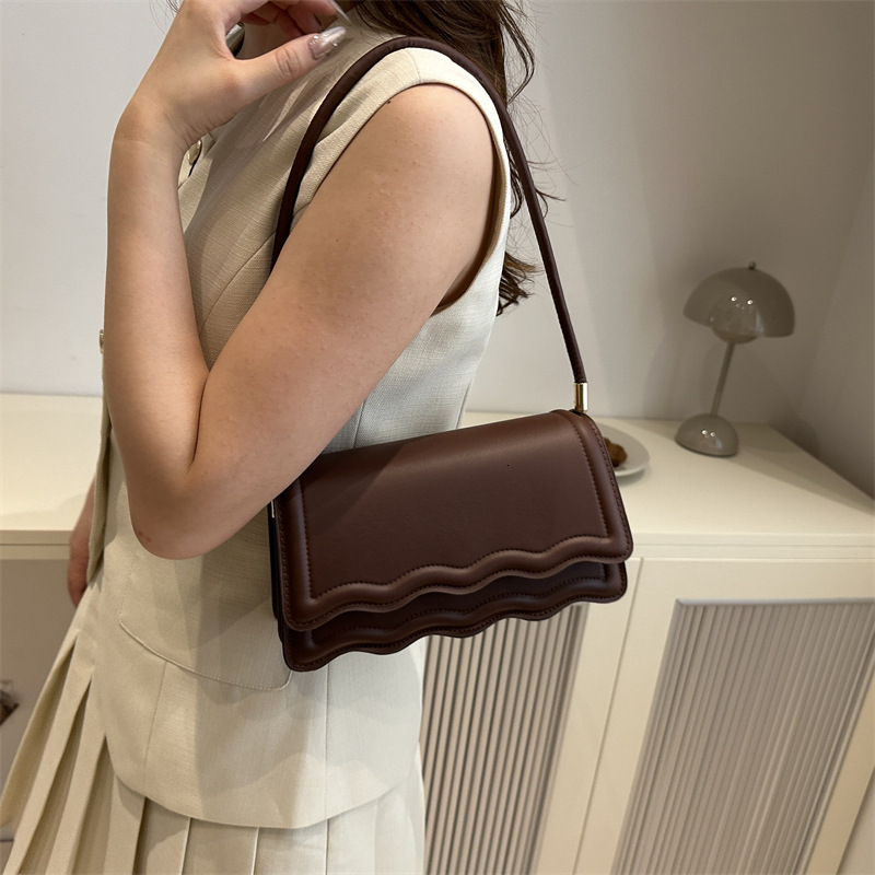 Free Shipping 2025 New Women's Designer Fashion Solid Color PU Shoulder Bag High Quality Elegant Lace Underarm Bag Wallet Banquet Bag