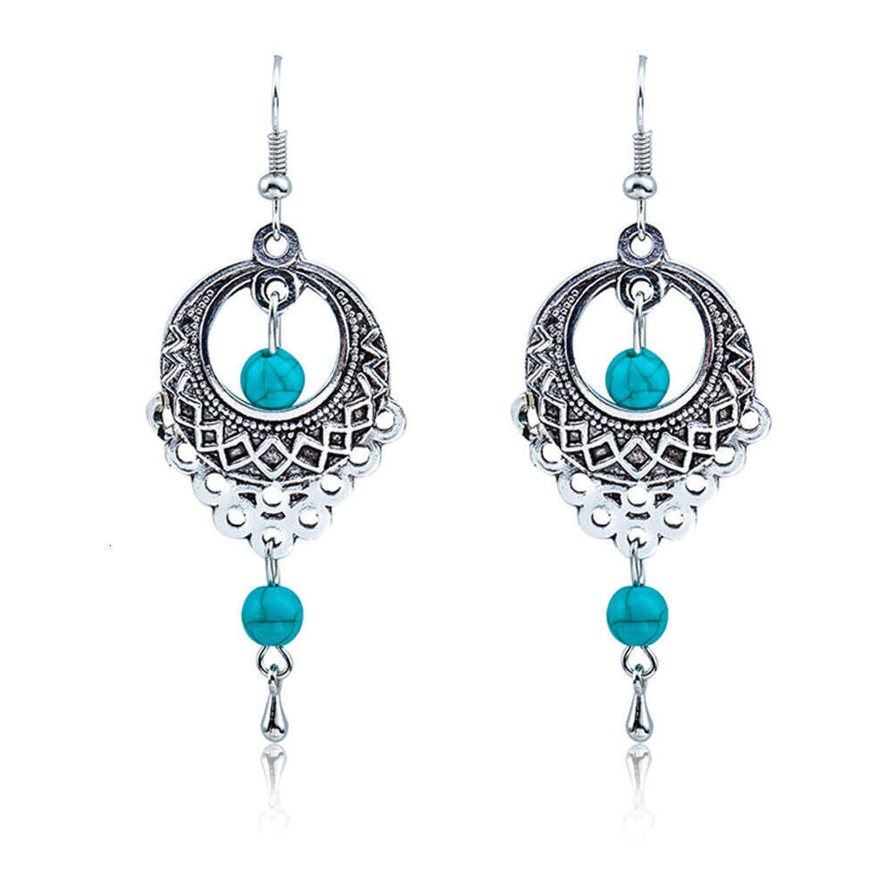Ethnic Exotic Metal Hollow Flower Earrings Bohemian Carved Palace Style Ear Pendants